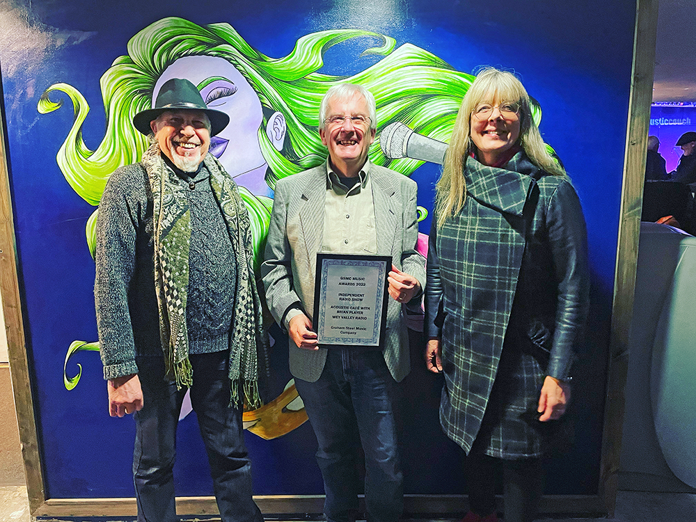 Brian Player recieving an award for Best Independent Radio Show in 2022