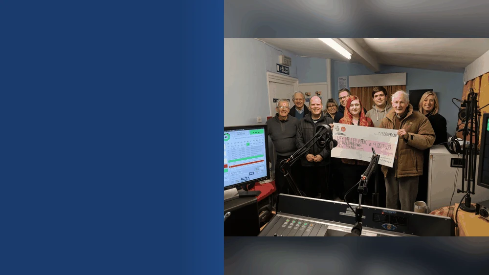 Wey Valley Radio volunteers with their National Lottery grant cheque
